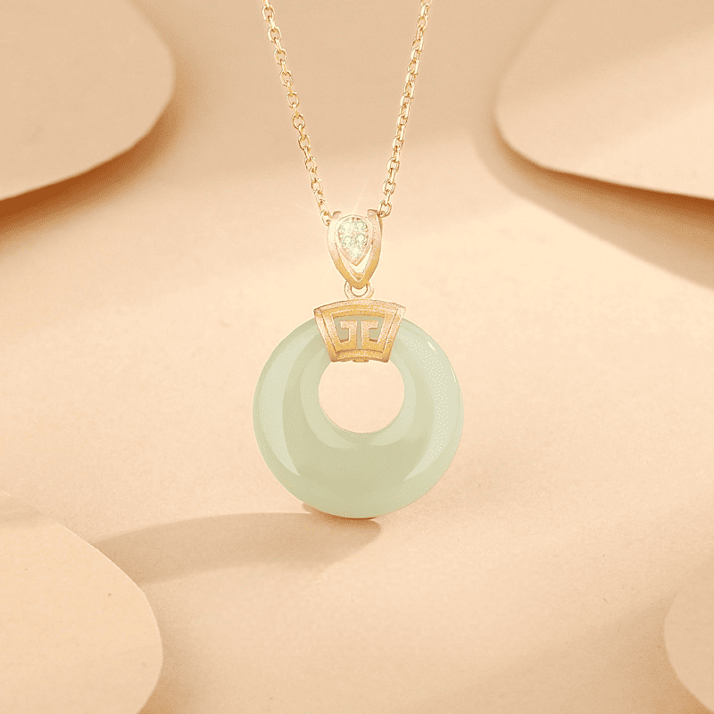 Golden “Ruyi” Jade Donut Pendant Necklace