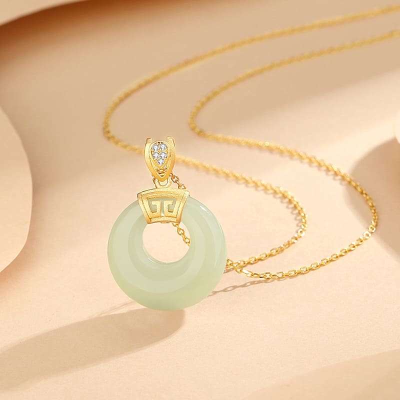 Golden “Ruyi” Jade Donut Pendant Necklace