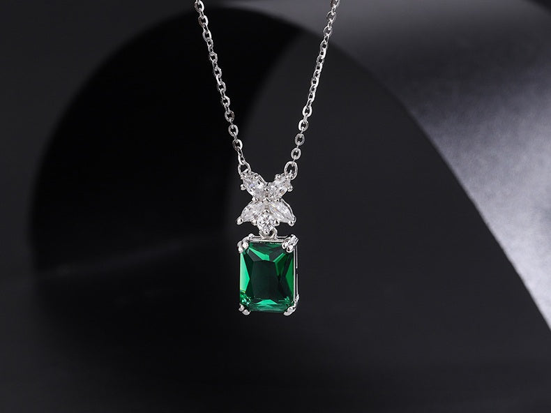 Radiant Green Gemstone Necklace with Butterfly Accent