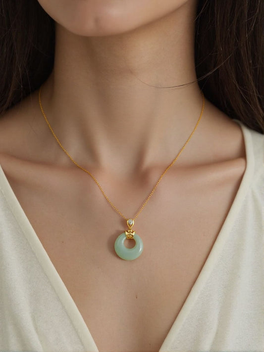 Golden “Ruyi” Jade Donut Pendant Necklace