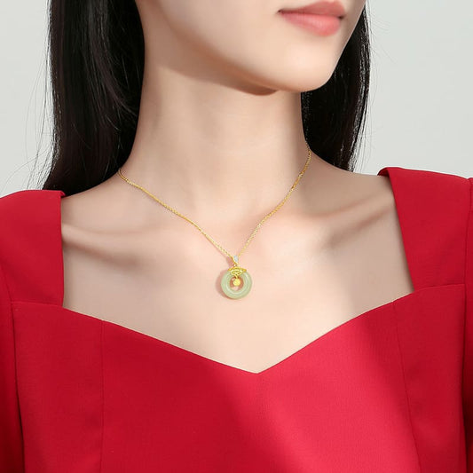 “Endless Prosperity” Jade Donut Pendant Necklace