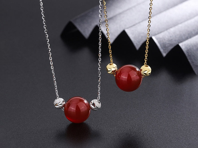 Elegant Red Jade Bead Necklace with Gold Accents