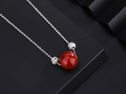 Elegant Red Jade Bead Necklace with Gold Accents