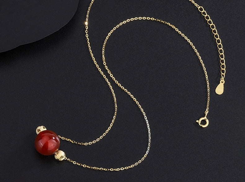Elegant Red Jade Bead Necklace with Gold Accents