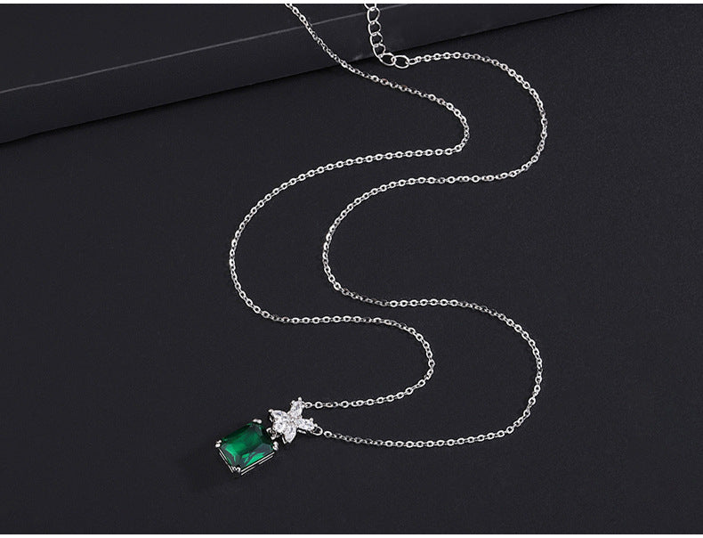 Radiant Green Gemstone Necklace with Butterfly Accent
